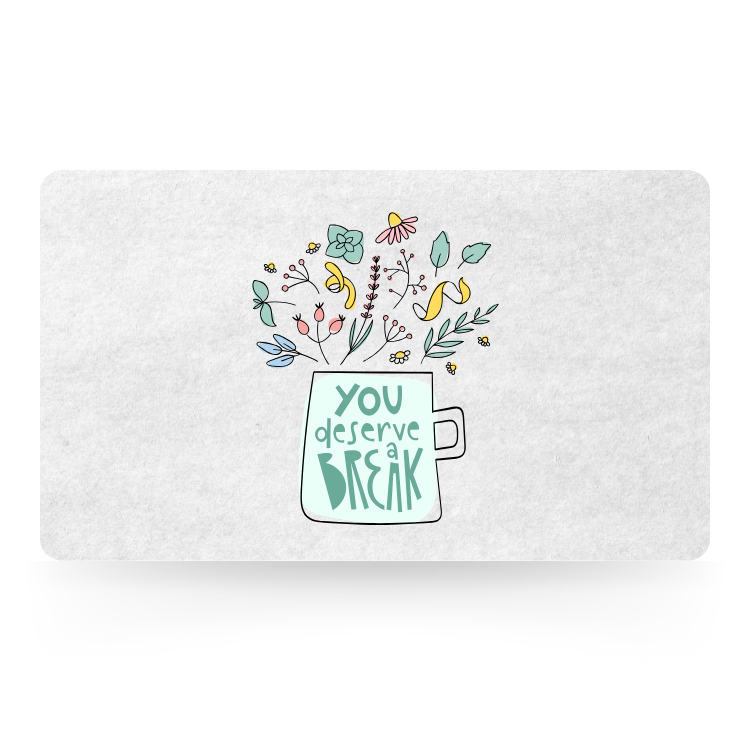 Whimsical gift card featuring a mug filled with wildflowers and the hand-drawn text "You deserve a break."